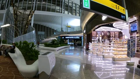 Abu Dhabi, UAE - January 8, 2025 - the departure area of Abu Dhabi Airport Stock Footage 302287050