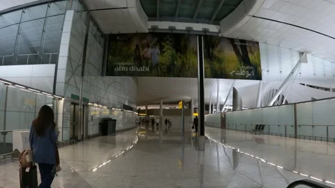 Abu Dhabi, UAE - January 8, 2025 - the departure area of Abu Dhabi Airport Stock Footage 302720908