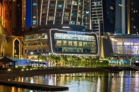 Abu Dhabi, UAE - March 29. 2019. View of Grand Hyatt hotel with night illumin Stock Photos