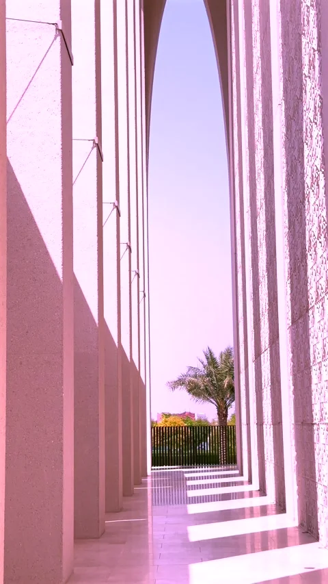 Abu Dhabi, UAE - September 9, 2024: Tall angular columns, sweeping arches Stock Footage 284246373