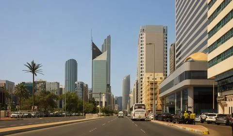 Abu Dhabi, UAE. View of a wide street with busy car traffic among skyscrapers Stock Photos