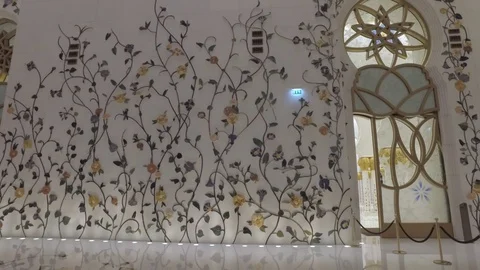 ABU DHABI, U.A.E. - JAN, 2018: amazing floral patterns on marble walls inside Stock Footage 97386286