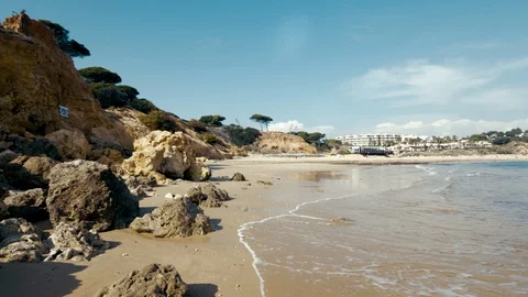 Abufeira beach front establishing shot Stock Footage 128396014