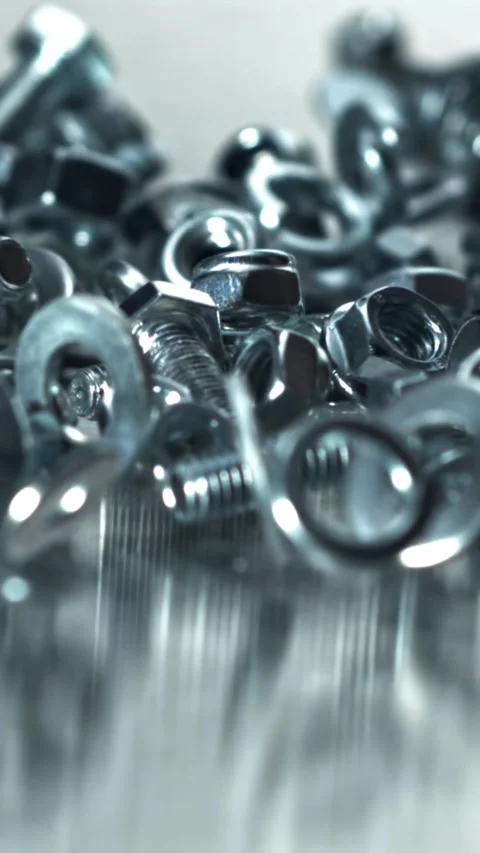 Abundant chrome hardware pile with reflective sheen Filmed on a high-speed Stock Footage 335395741