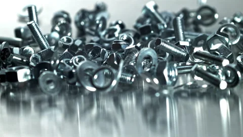 Abundant chrome hardware pile with reflective sheen Filmed on a high-speed Stock Footage 335412511