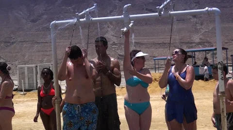 Abundant shower after bathing in the Dead sea Stock Footage 39672704