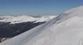 Abyss Ravine Mountain Steep Winter Snow Covered Capped Panoramic View Pan Left HD Footage