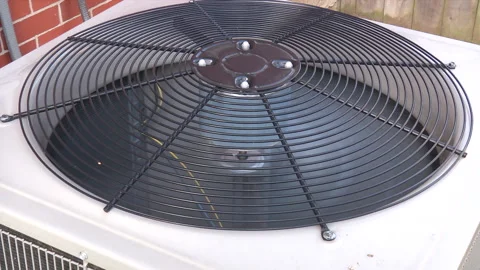 AC Unit Kicking On And Running Outside Stock Footage 176469413