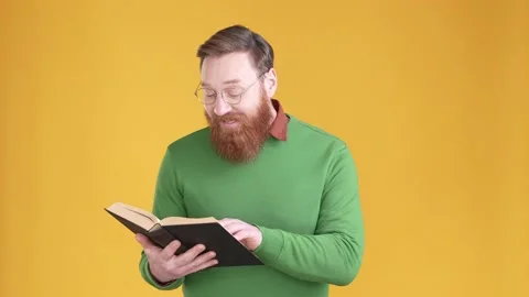 Academic guy read favorite dictionary hug isolated shine color background 스톡 동영상 170675202