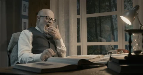 Academic professor studying all night in his office Stock Footage 151178898