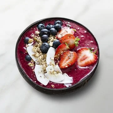 Acai in coconut shell Stock Photos