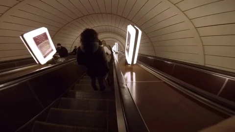 Accelerated descent on the long escalator of the Kiev underground Stock Footage 73769389
