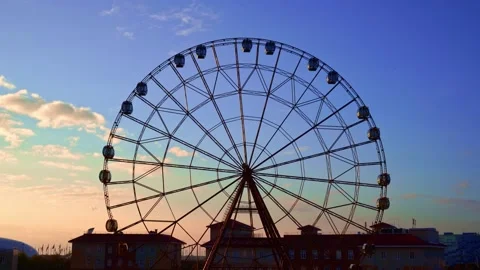 Accelerated. Ferris wheel against a blue sky. Stock Footage 143340719