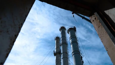 Accelerated filming of chimney repairs through the doorway of the boiler room Stock Footage 249526859