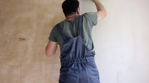 Accelerated footage of puttying walls. Stock Footage 242864109