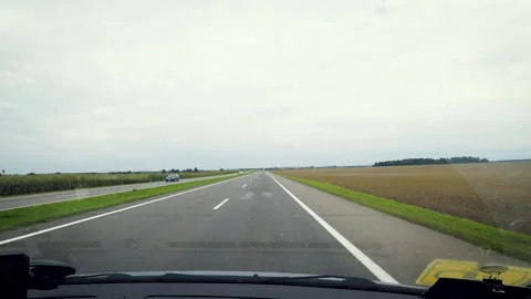 Accelerated front view of driving in a highway. Stock Footage 135396115