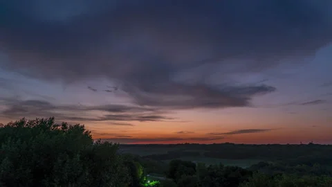 Accelerated movement of clouds in the sky at sunset. Timelapse. Video stock 159876488