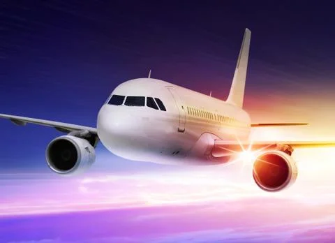 Accelerated plane at sunset Stock Photos