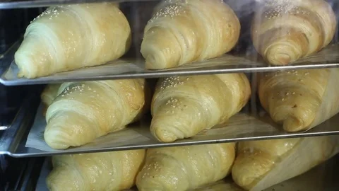 Accelerated process of baking croissants Video stock 83561373