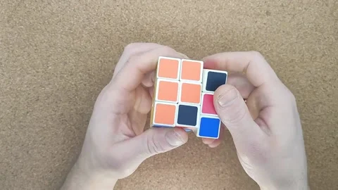 Accelerated shooting of the rubik's cube assembly Stock Footage 177595982