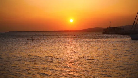 Accelerated shooting Sunset on the sea The sun goes below the horizon Stock Footage 150250962
