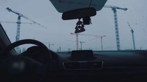 Accelerated shooting of tower cranes from a car Stock Footage 194106287