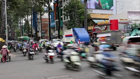 Accelerated Traffic on crossing in the center of Saigon City. Stock Footage 90377995