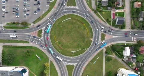 Accelerated video 4x aerial view above road junction with heavy traffic Stock Footage 212435116