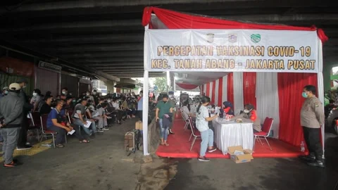 ACCELERATION PHASE TO GIVE ALL INDONESIA FREE COVID 19 VACCINE Video stock 155883703