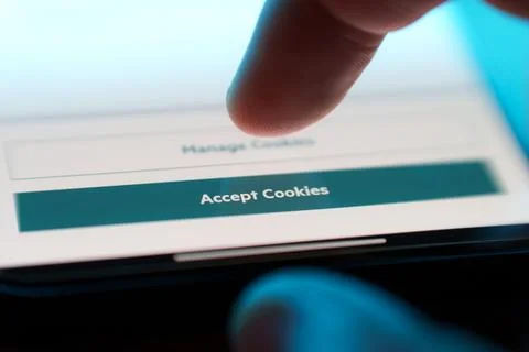 Accept cookies button on internet webpage on smartphone. Internet browsing Stock Photos