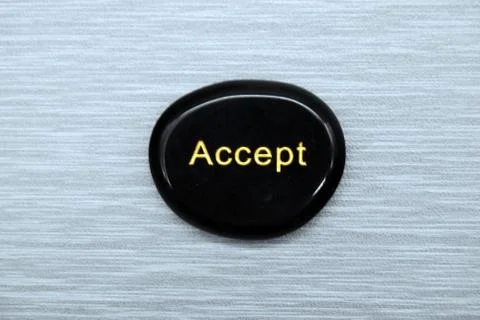 Accept Mood Stone on Gray Background Stock Photos