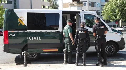 Accepts eight years in prison for shooting his father in the head in Guntín (Lug Stock Footage 312747819