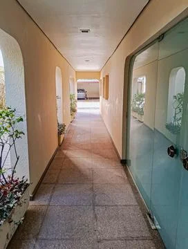 Access corridor to internal parking. Stock Photos