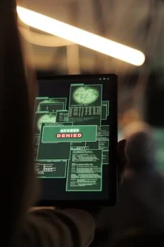 Access denied message on tablet, hacker failed database hacking Fotos de archivo