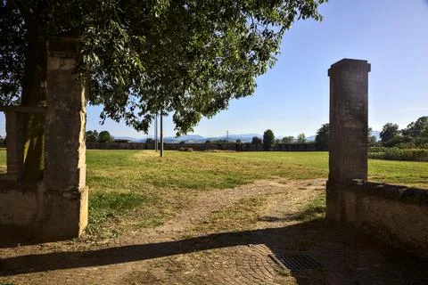 Access to an empty field on a sunny day Stock Photos