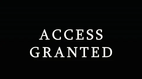 ACCESS GRANTED text overlay with digital particles against dark background .. Stock Footage 343479526