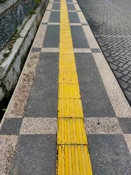 Accessibility Path: Tactile Paving for the Visually Impaired Stock Photos