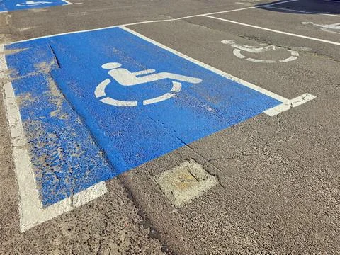 Accessible Parking Space Designed for Individuals With Disabilities in a Lot Stock Photos