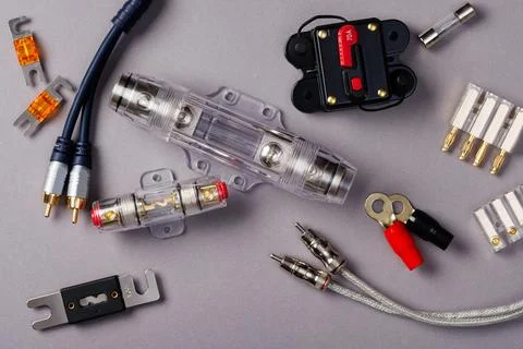 Accessories for installing car audio components. Light background. Top view Stock Photos