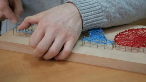 Accessories for needlework on wooden table. Stock Footage 73802446