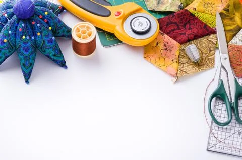 Accessories for patchwork top view on a white surface Fotos Stock