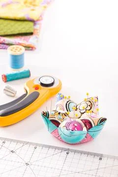 Accessories for patchwork  on a white surface 스톡 사진