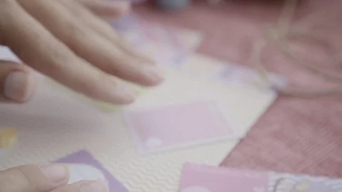 Accessories for scrapbooking on table, fittings for needlework Stock Footage 79437523