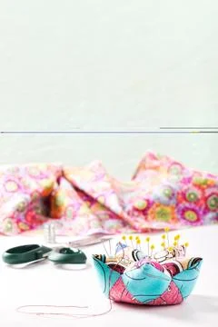 Accessories for sewing on a white surface Fotos de archivo