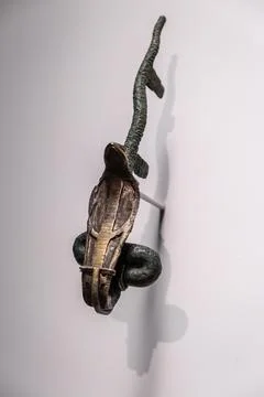 Accessory for statue in the form of uraeus, silver and bronze, low period, Eg Stock Photos