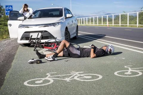 Accident car crash bicycle on bike lane Stock Photos