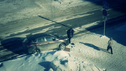 Accident. An elderly driver inspects the car after a collision with a post Stock Footage 86721576