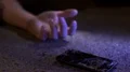 The accident with hand and broken phone. Evening night time. Real time capture 4k or 4k+ Resolution