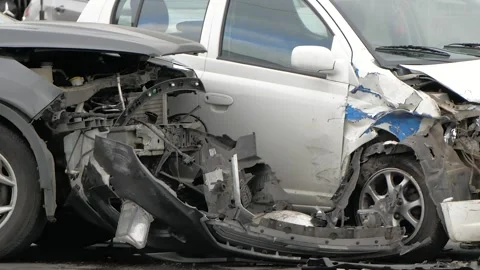 An accident on the road, the scene of a collision between two cars.  Video stock 295436003