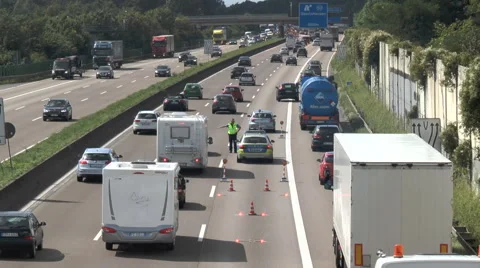 Accident scene and traffic jam on German highway Видео 65774372